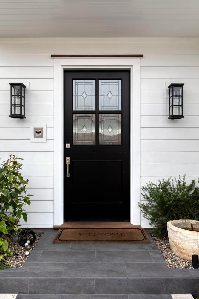 black door with frosted glass panes.