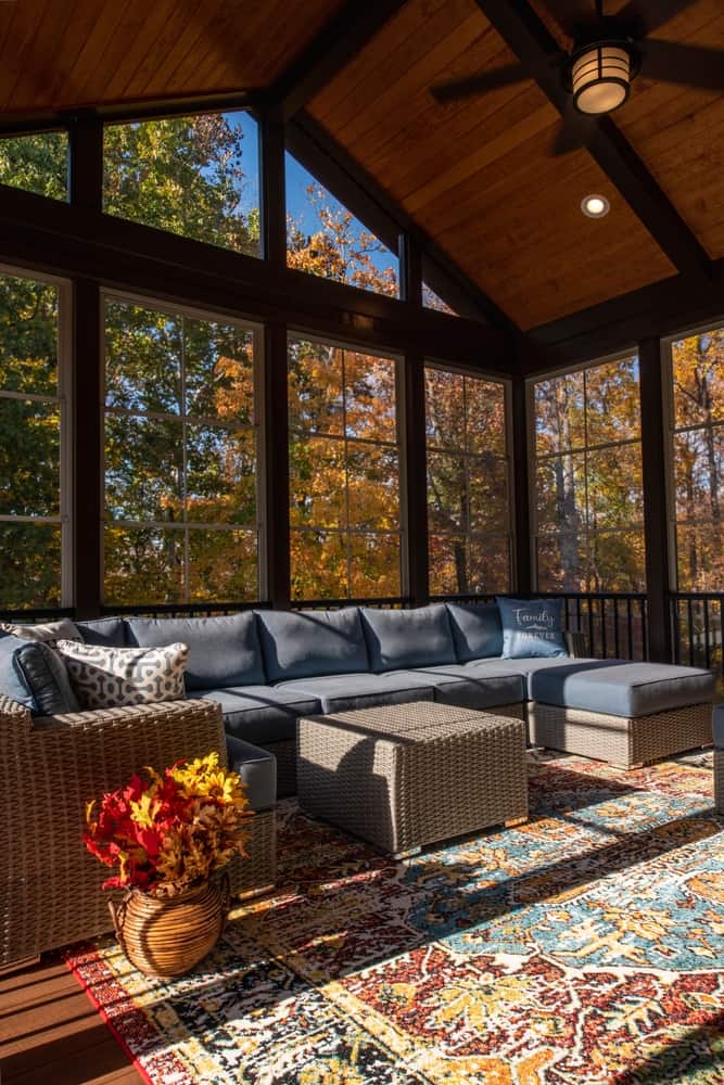 large sunroom with high ceiling.